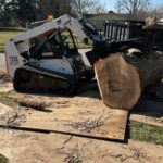 Bobcat in use with yard protection